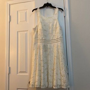 size 16/17 Cream short cocktail dress with lace detail, exposed gold zipper